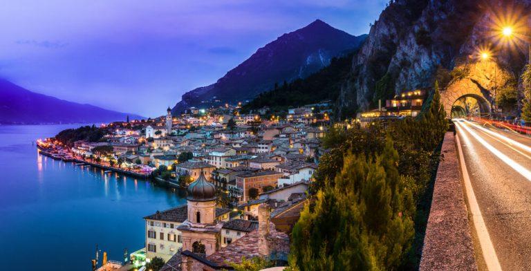 Panorama of the beautiful village Limone sul Garda at night. Lake Garda in italy